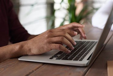 person-using-macbook Person Using Macbook 2